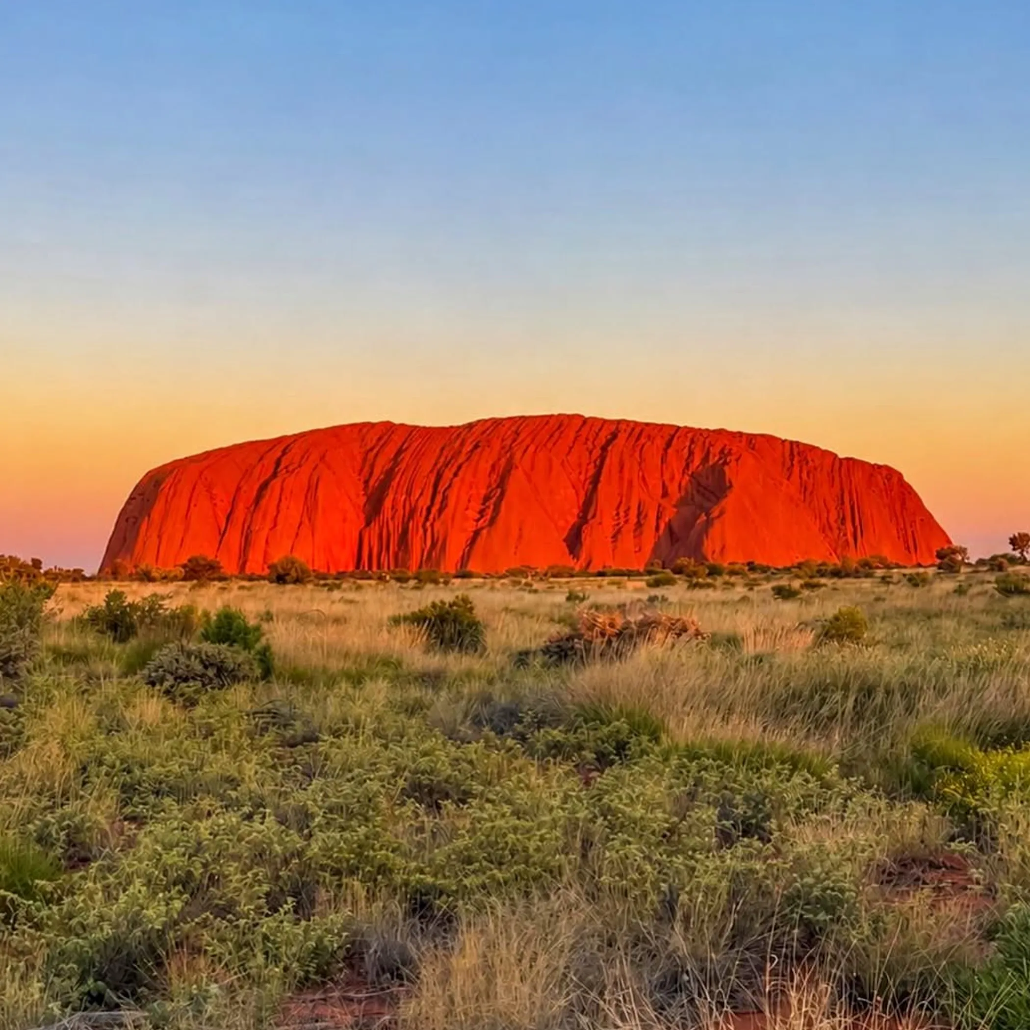uluru under clear skies